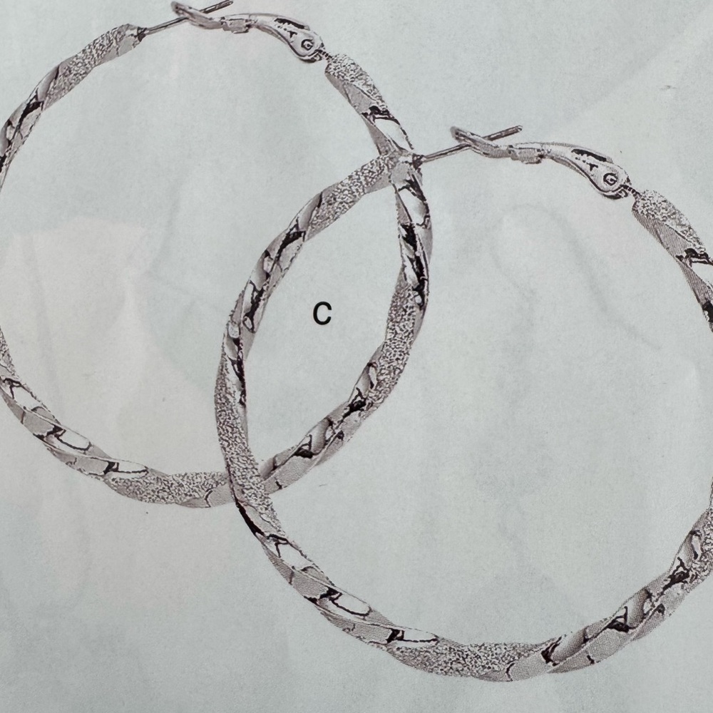 Park Lane Swirl Silvertone Textured Hoop Earrings